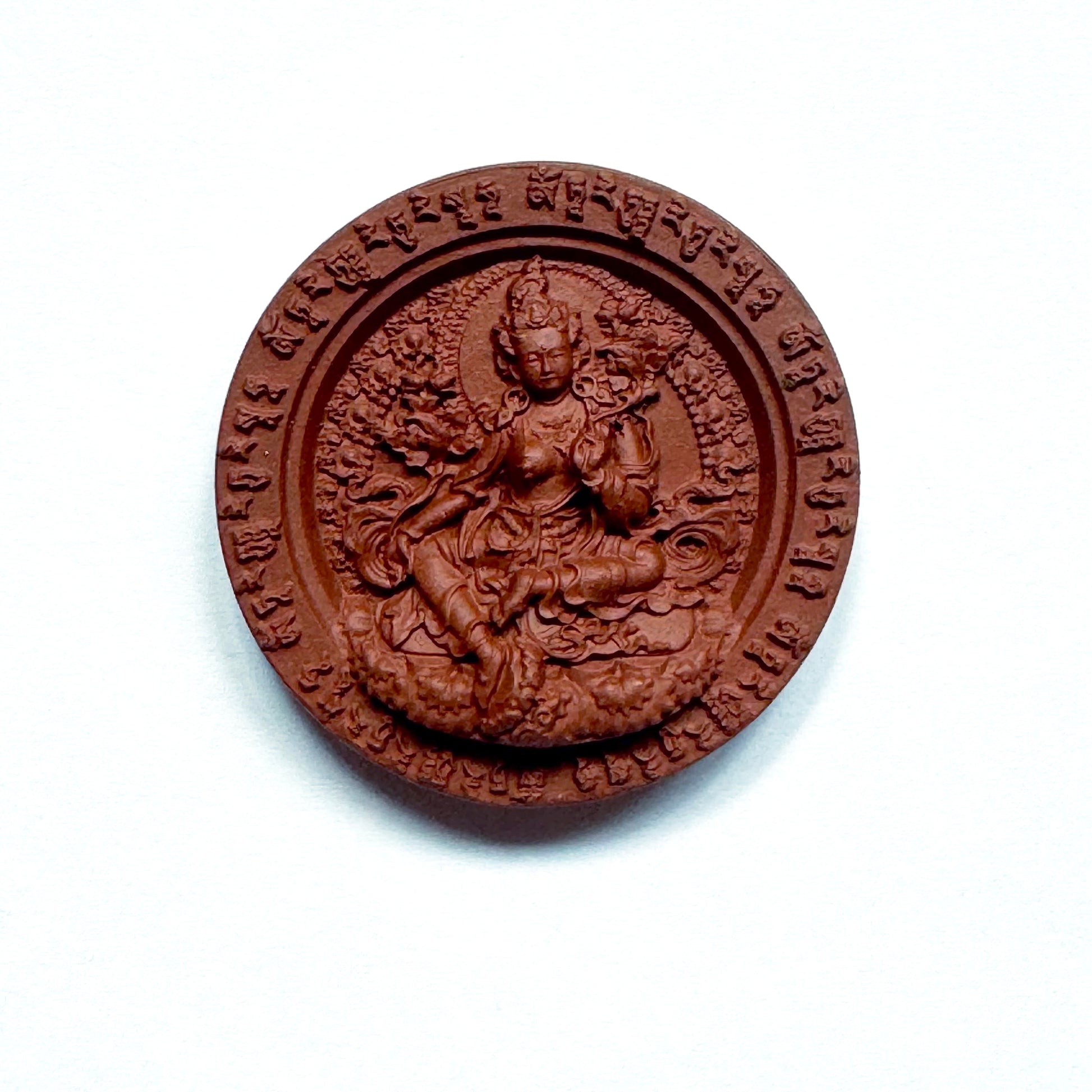 Exquisitely crafted Green Tara tsa tsa in refined clay with gold, silver, coral, pearl, amber & nectar pills, detailed with the Green Tara mantra.