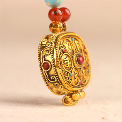 Colgante Gau de forma ovalada Mani Mantra