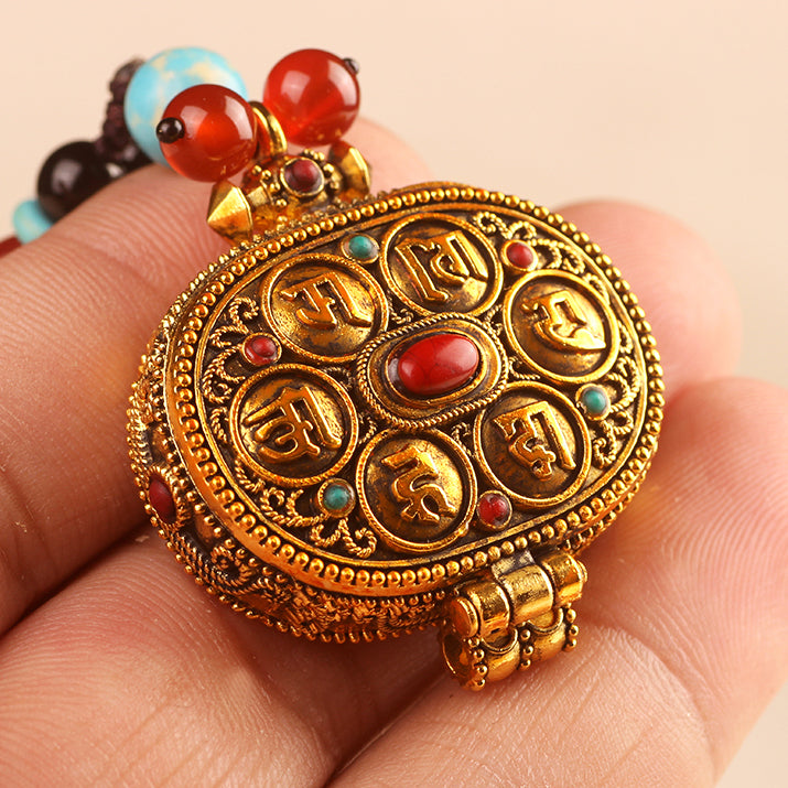 Colgante Gau de forma ovalada Mani Mantra