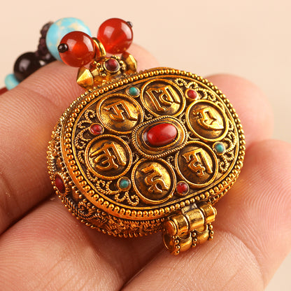 Colgante Gau de forma ovalada Mani Mantra