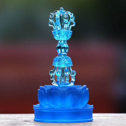 A radiant Liuli crystal blue vajra with lotus symbolizing Akshobhya Buddha’s wisdom and purity—an exquisite altar offering of protection.