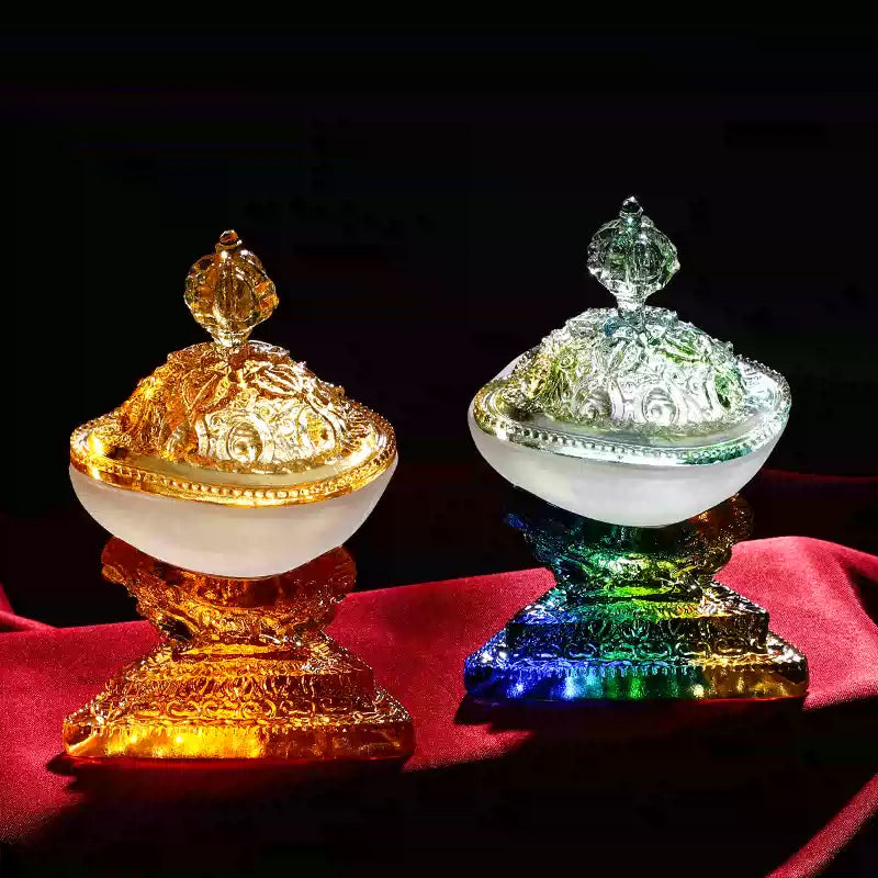 This magnificent liuli crystal kapala inner offering set in detailed craftsmanship with three skulls on base and double vajra cover. 