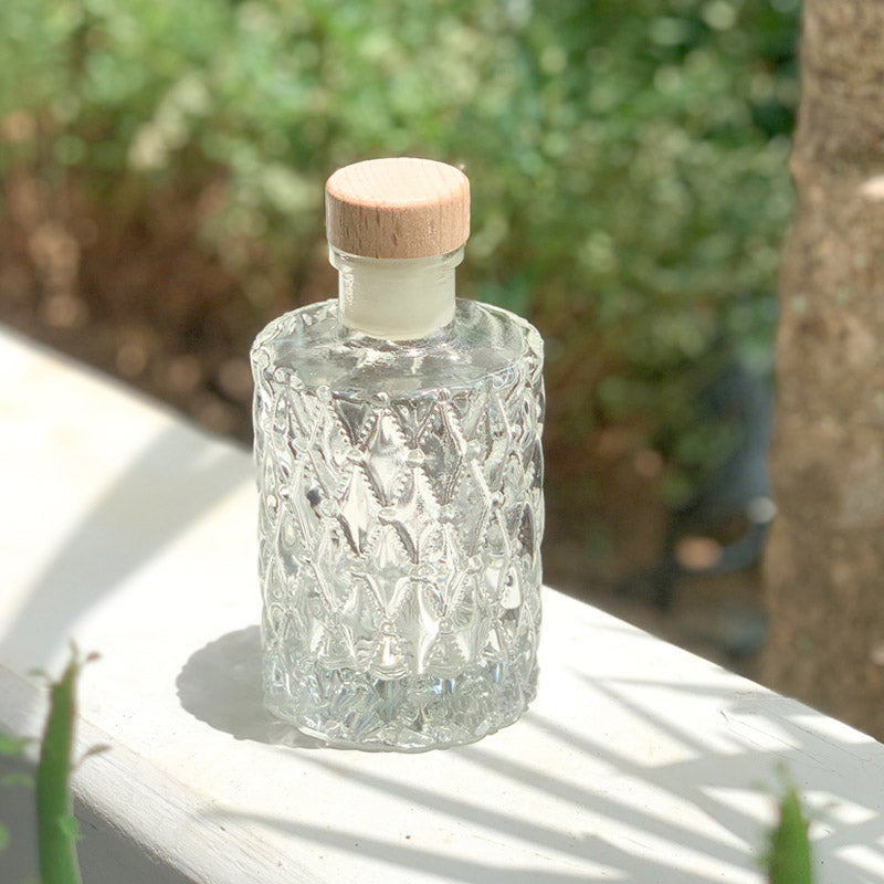 Práctica botella de vidrio hermética con tapón de goma pequeña